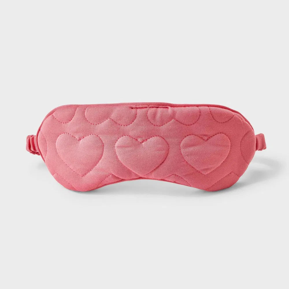 Rose-pink sleep mask with heart quilting